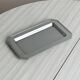 Small rectangular tray made of lightweight metal.