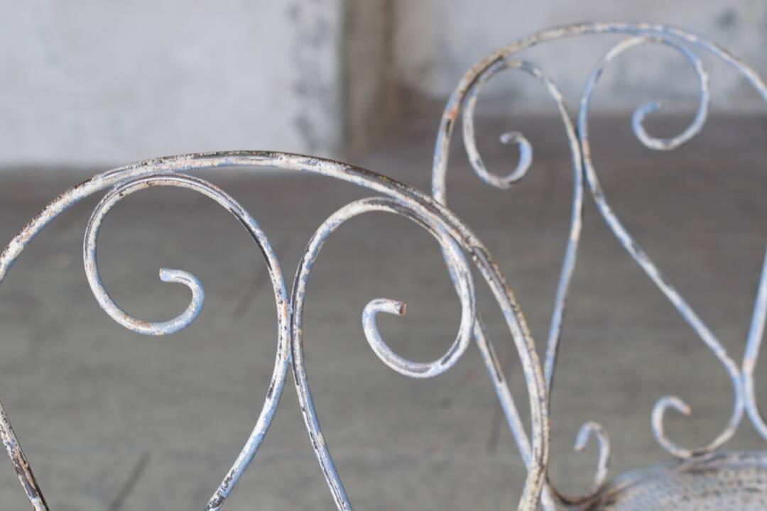 Two iron garden chairs 1950