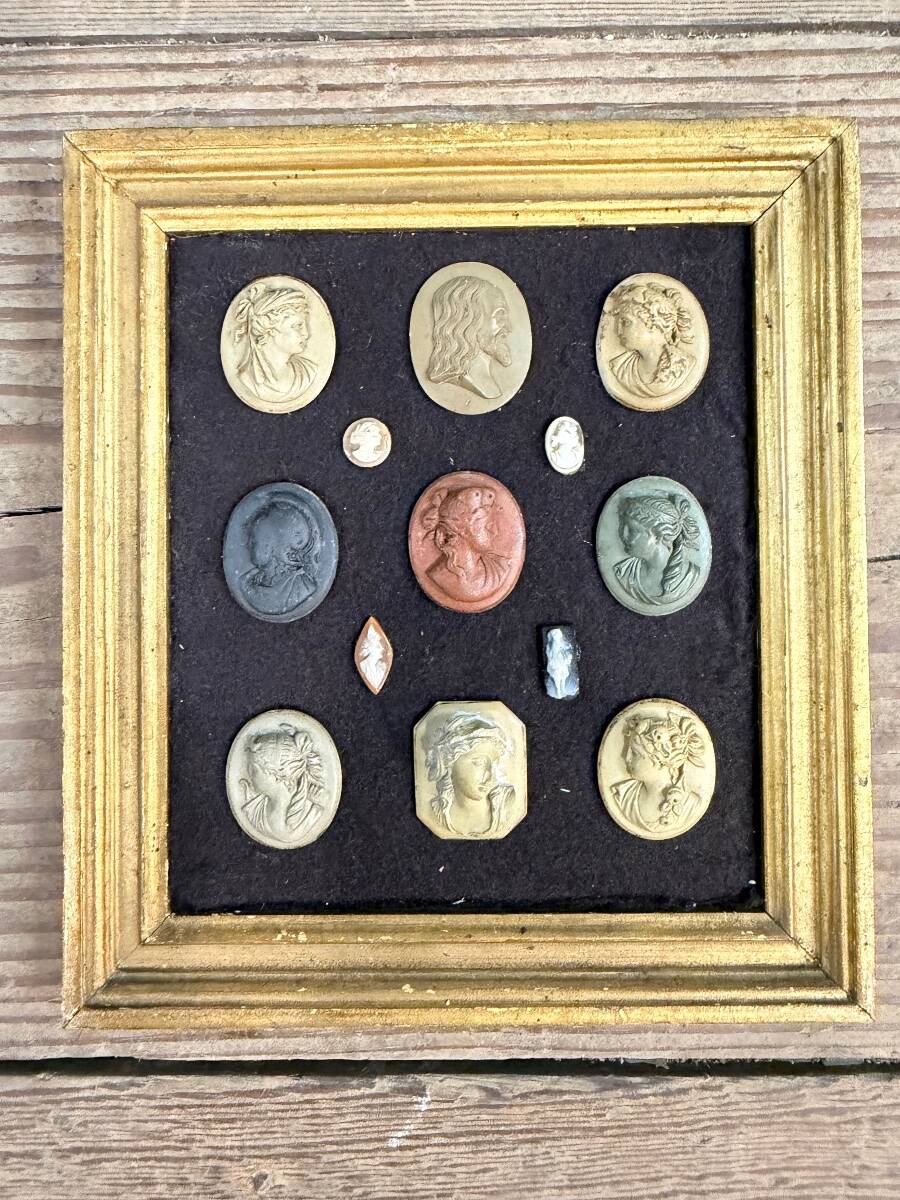 Collection of cameos and intaglios, shells and lava stones, around 1900.