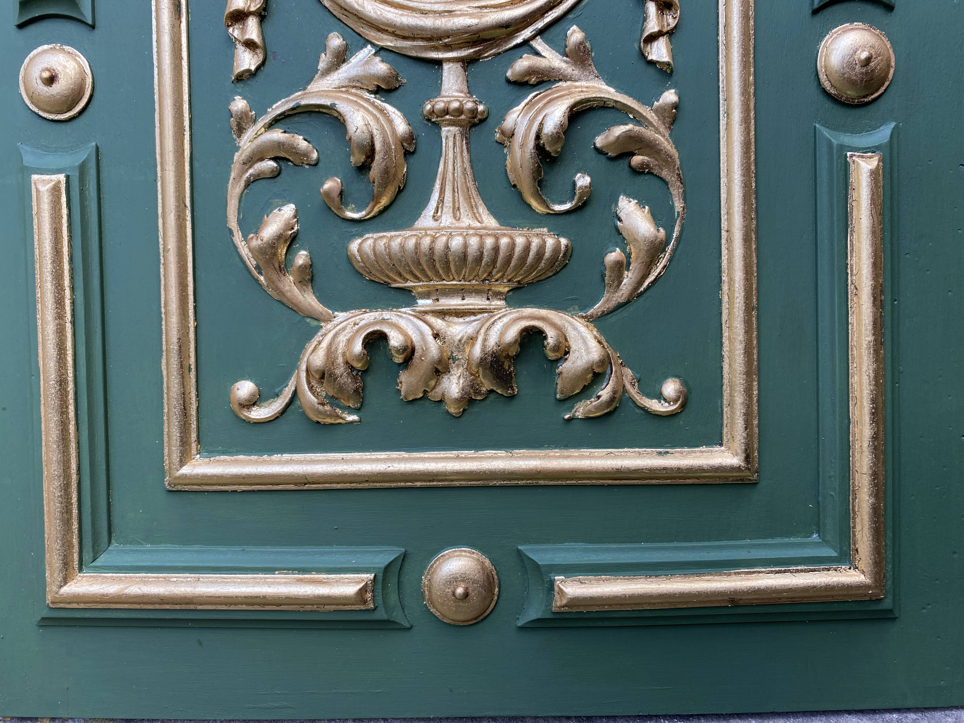 Pair of carved and leaf-gilded wooden panels