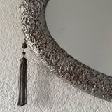 Silver oval Art Deco mirror
