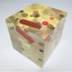 Paperweight sculpture block resin inclusions sewing design 70s