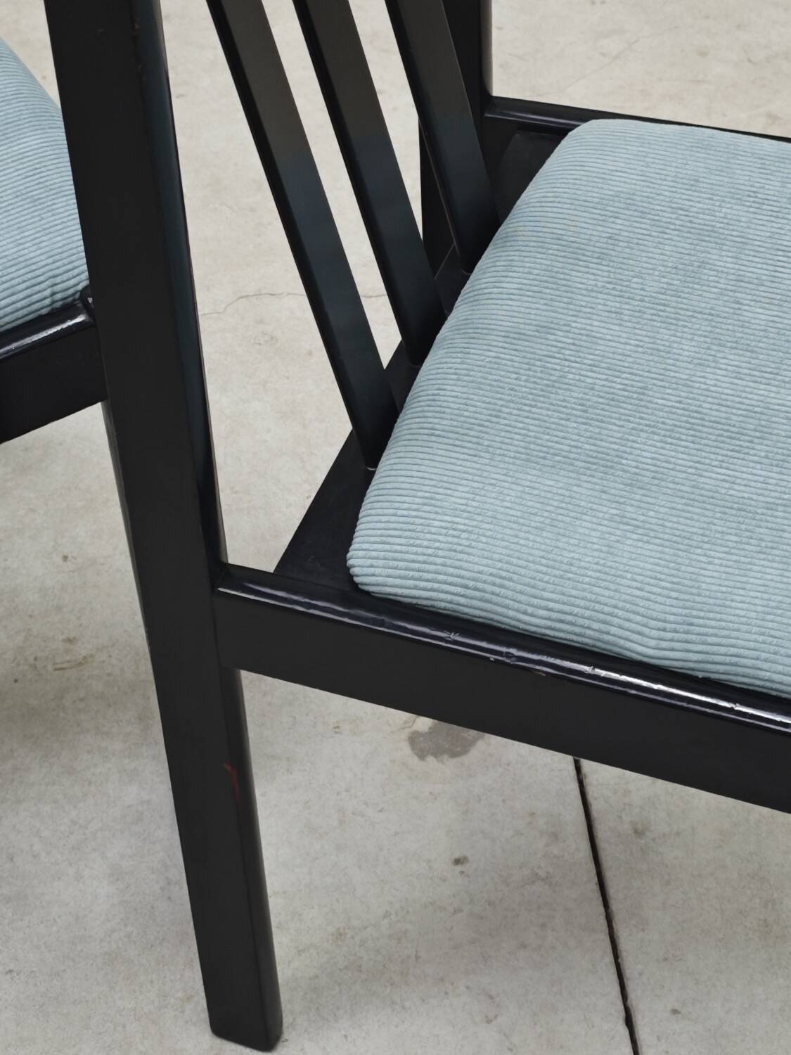 Set of 4 modernist black chairs with light blue ribbed fabric