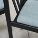Set of 4 modernist black chairs with light blue ribbed fabric