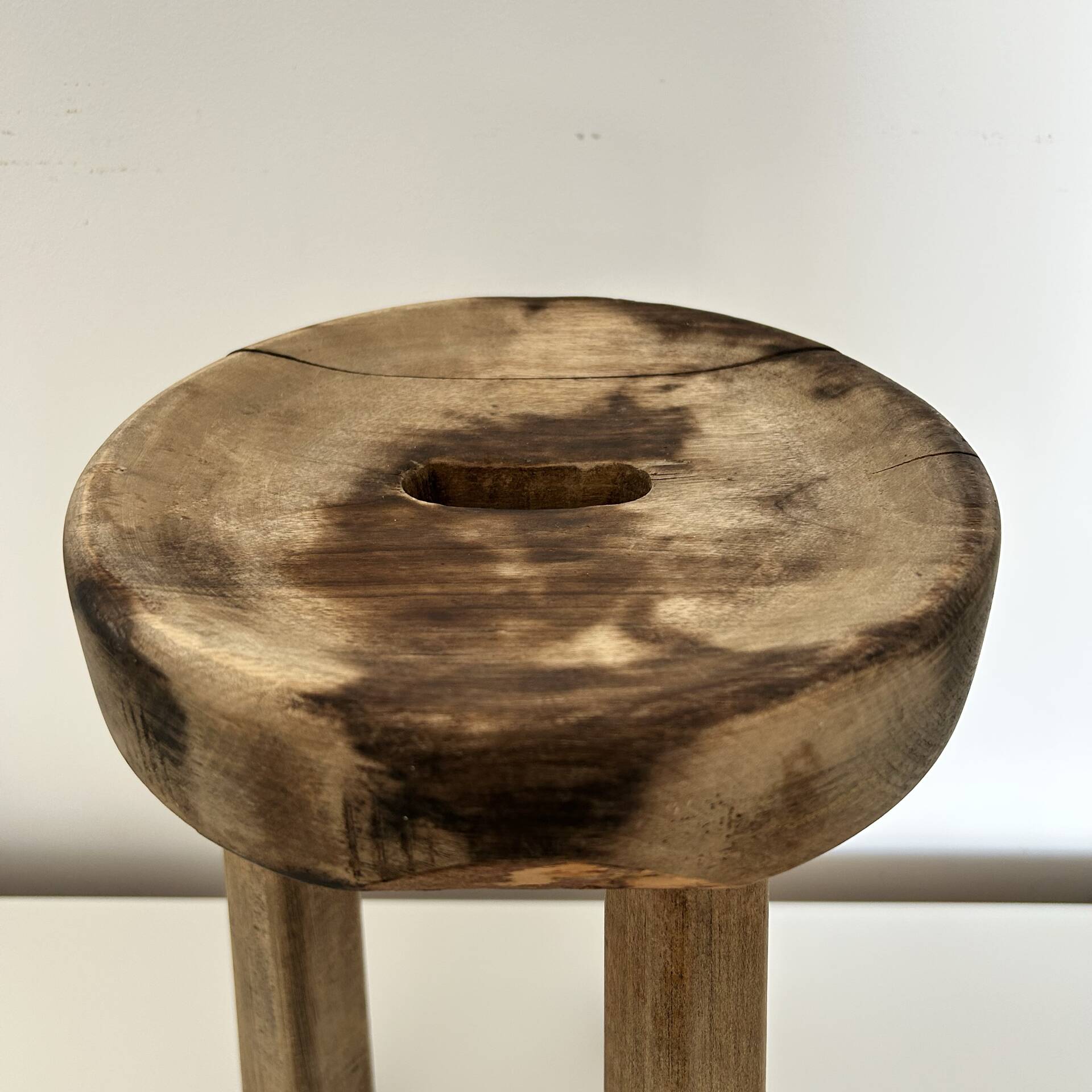 Patinated tripod stool