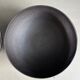 Pair of black lacquered metal catchall bowls
