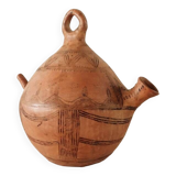 Antique oriental clay pitcher.