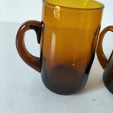 Pair of vintage amber glass tankards