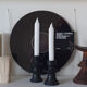 Set of two candlesticks in black tadelakt
