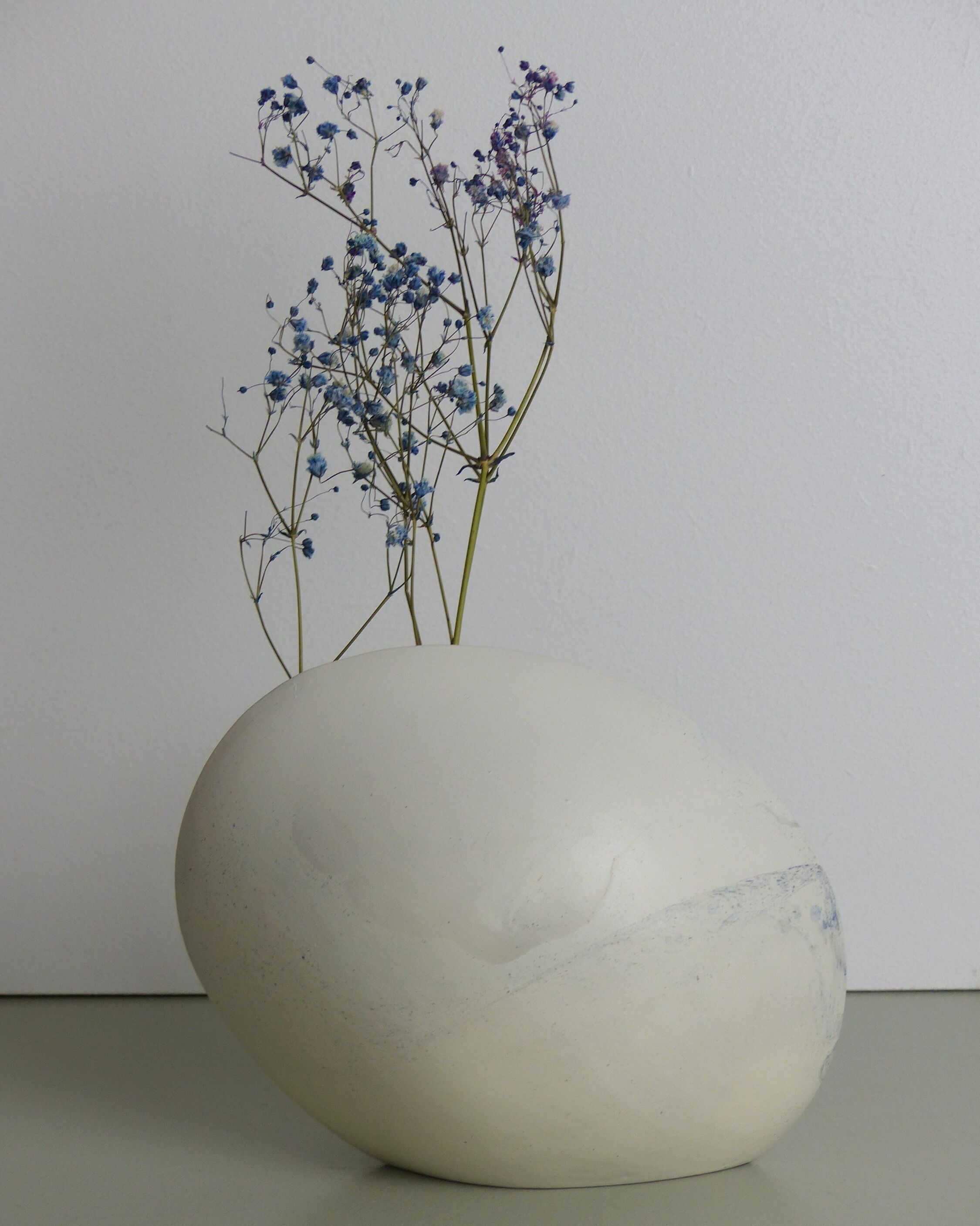 White and blue oval vase