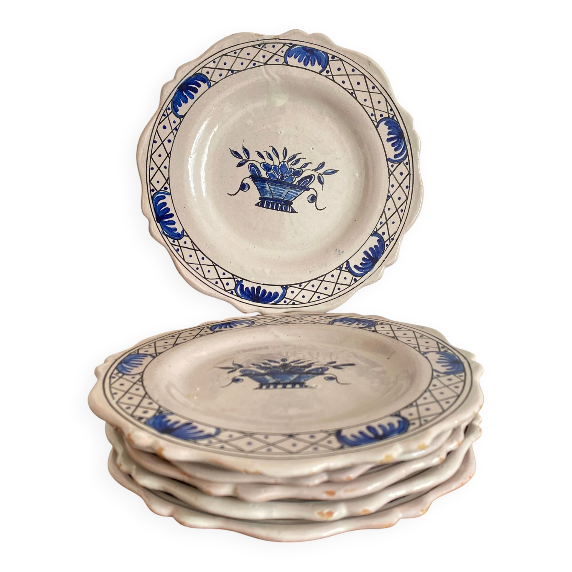 Dessert plates in Rouen faience with hand decoration.