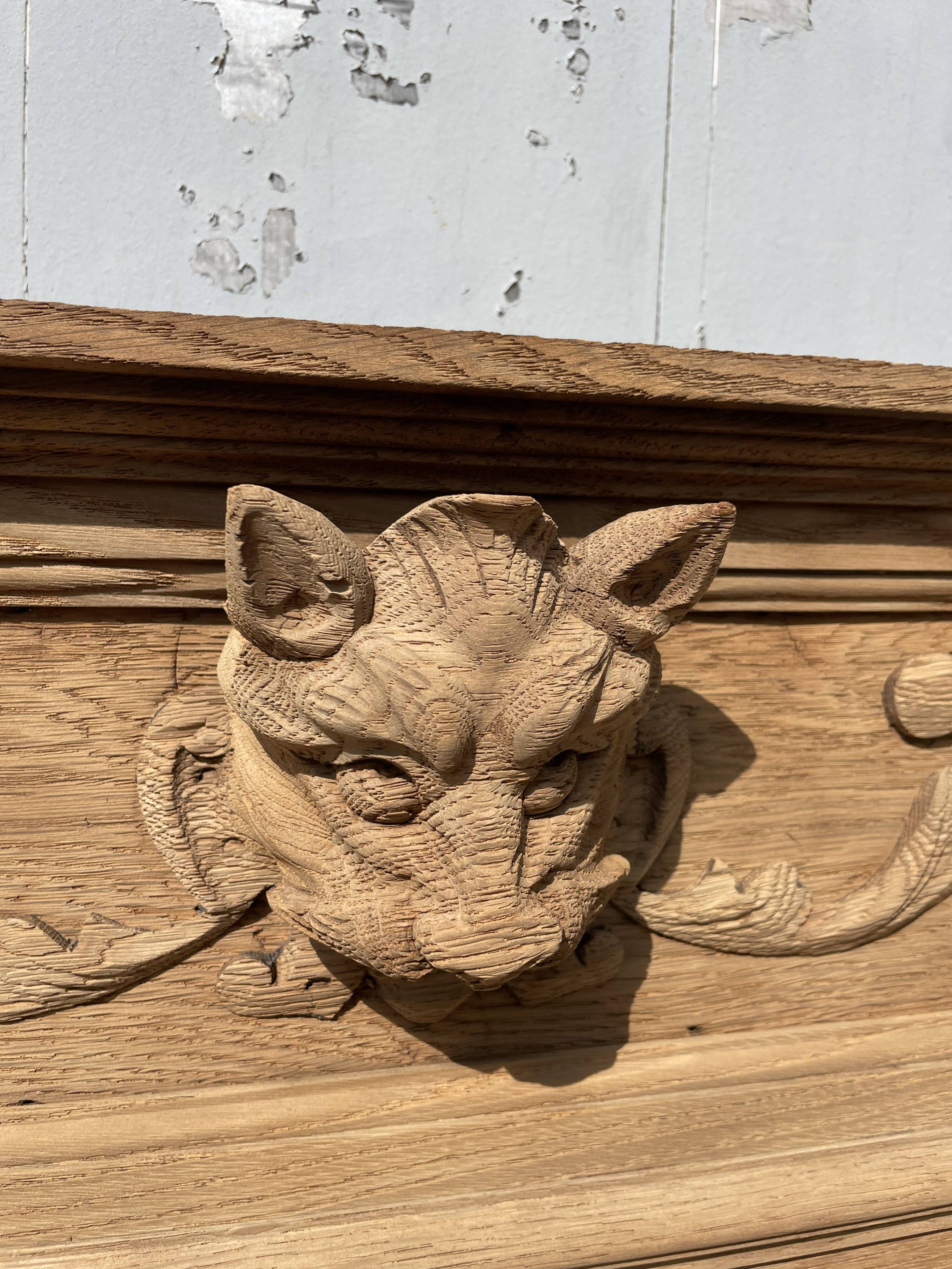 Mirror in oak aero erased wolf's head Henri II