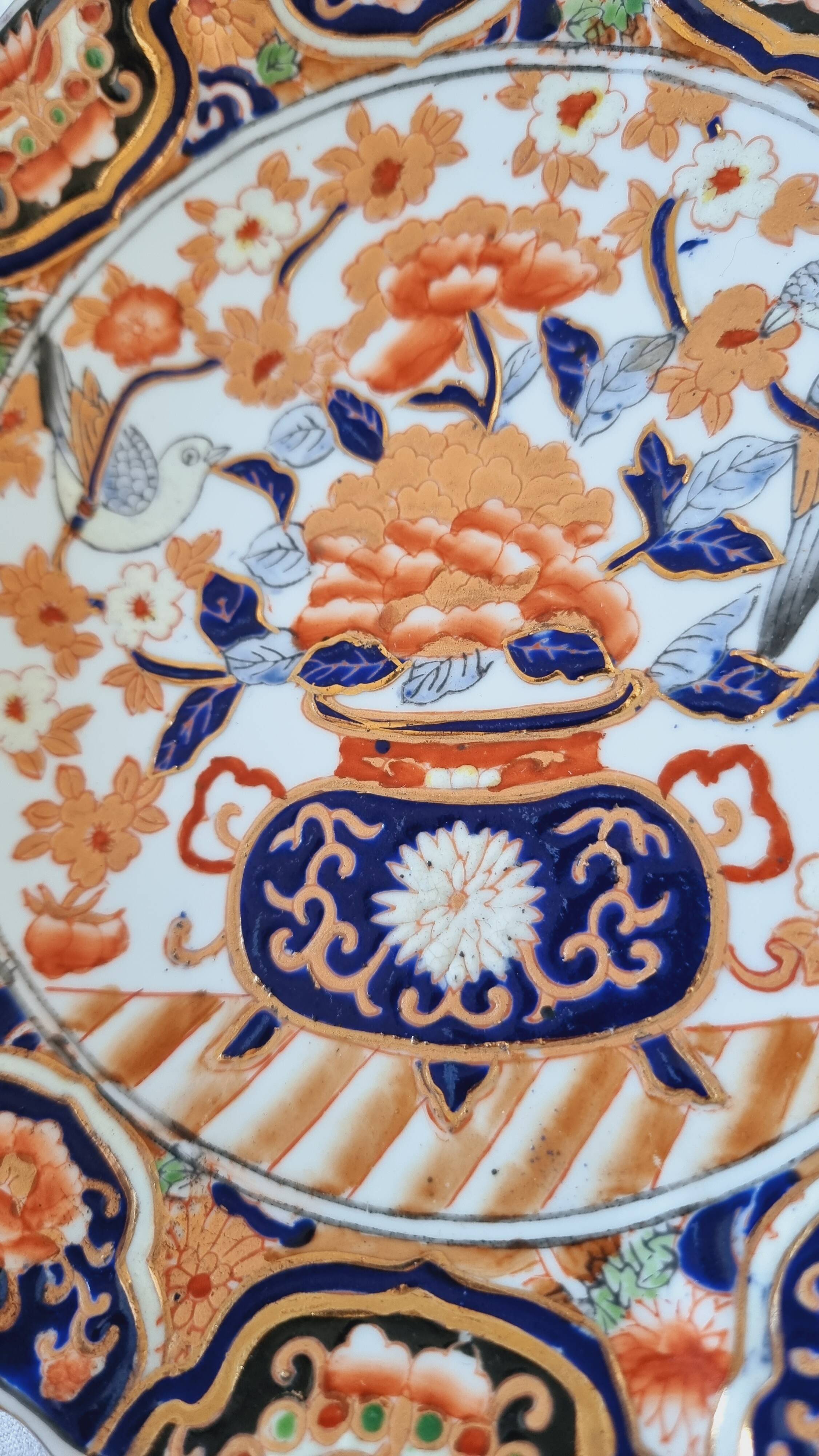 Imari-style porcelain plate, hand-painted, Japan, mid-20th century.