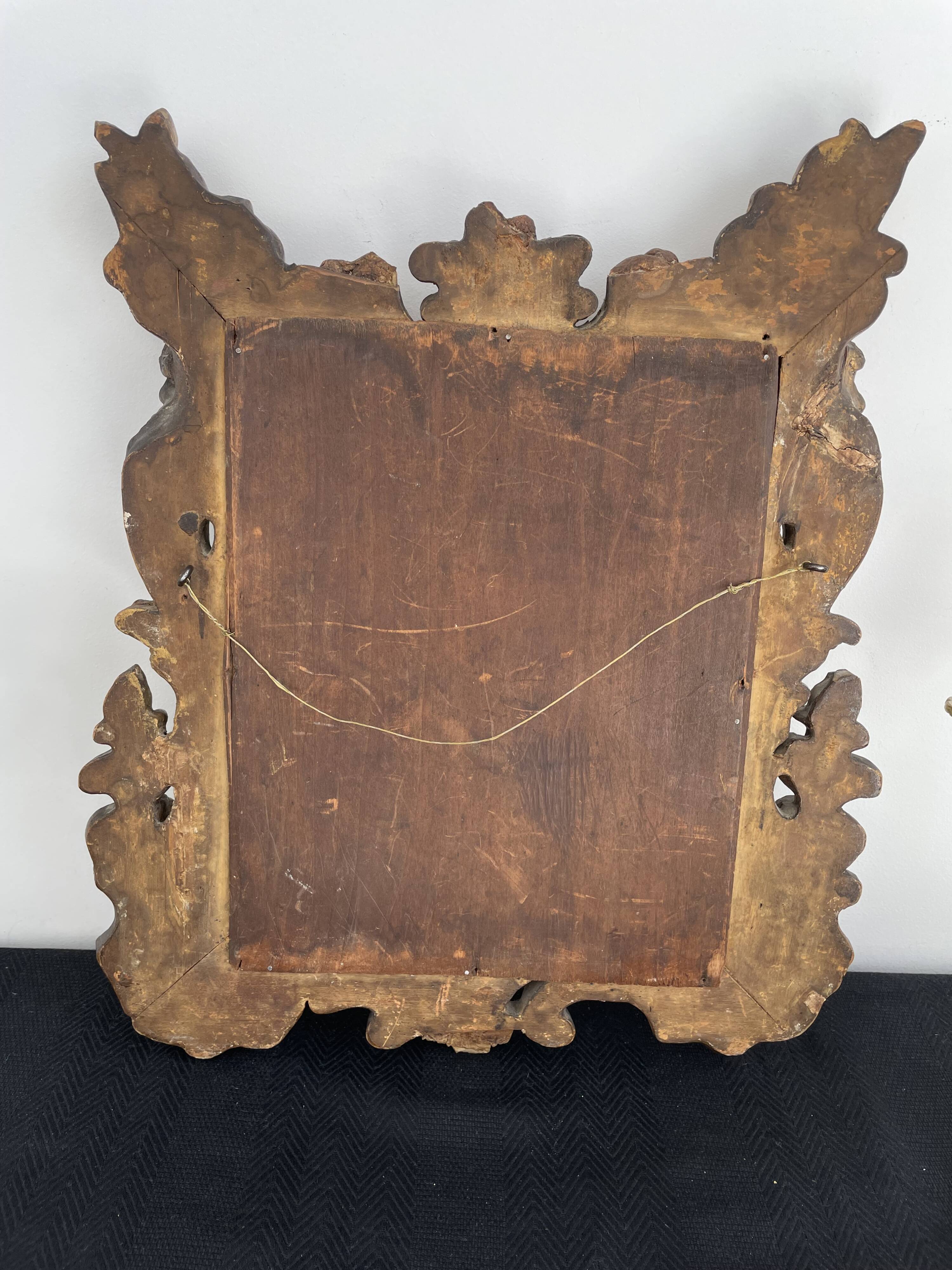 Miroir en bois sculpté et doré