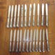 23 silver metal knives