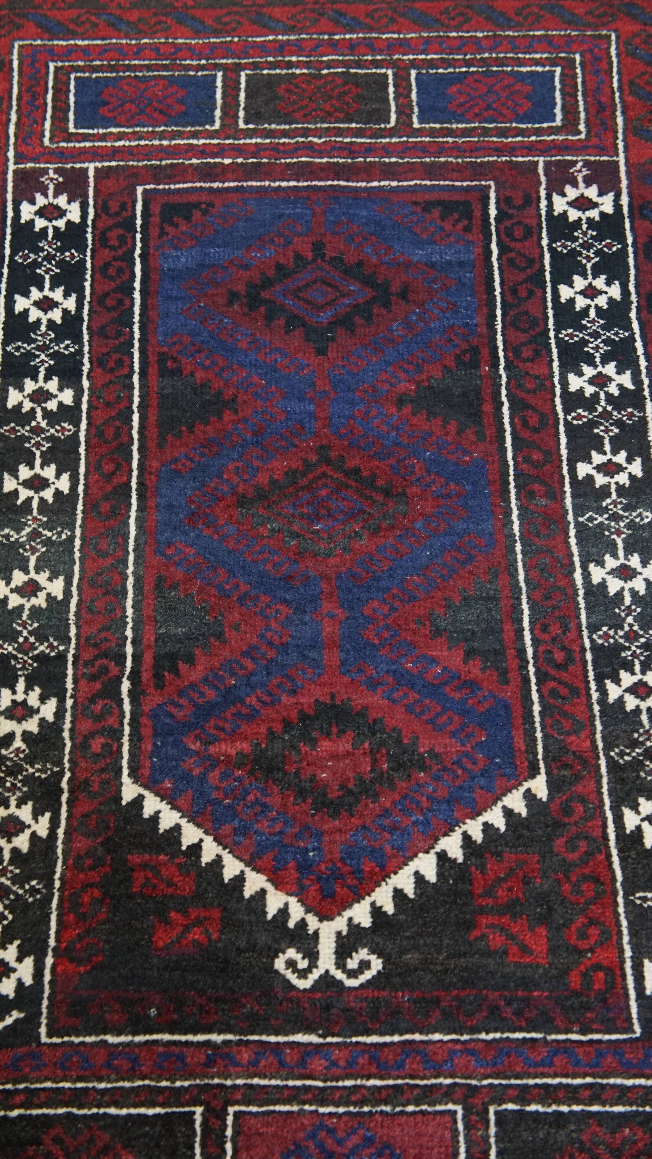 Hand-Knotted Rug with Burgundy Red, Dark Blue, and Beige Tones 143x88 cm
