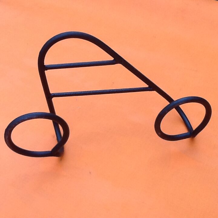 Former industrial-style wall coat rack