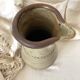 Vintage handcrafted terracotta pitcher