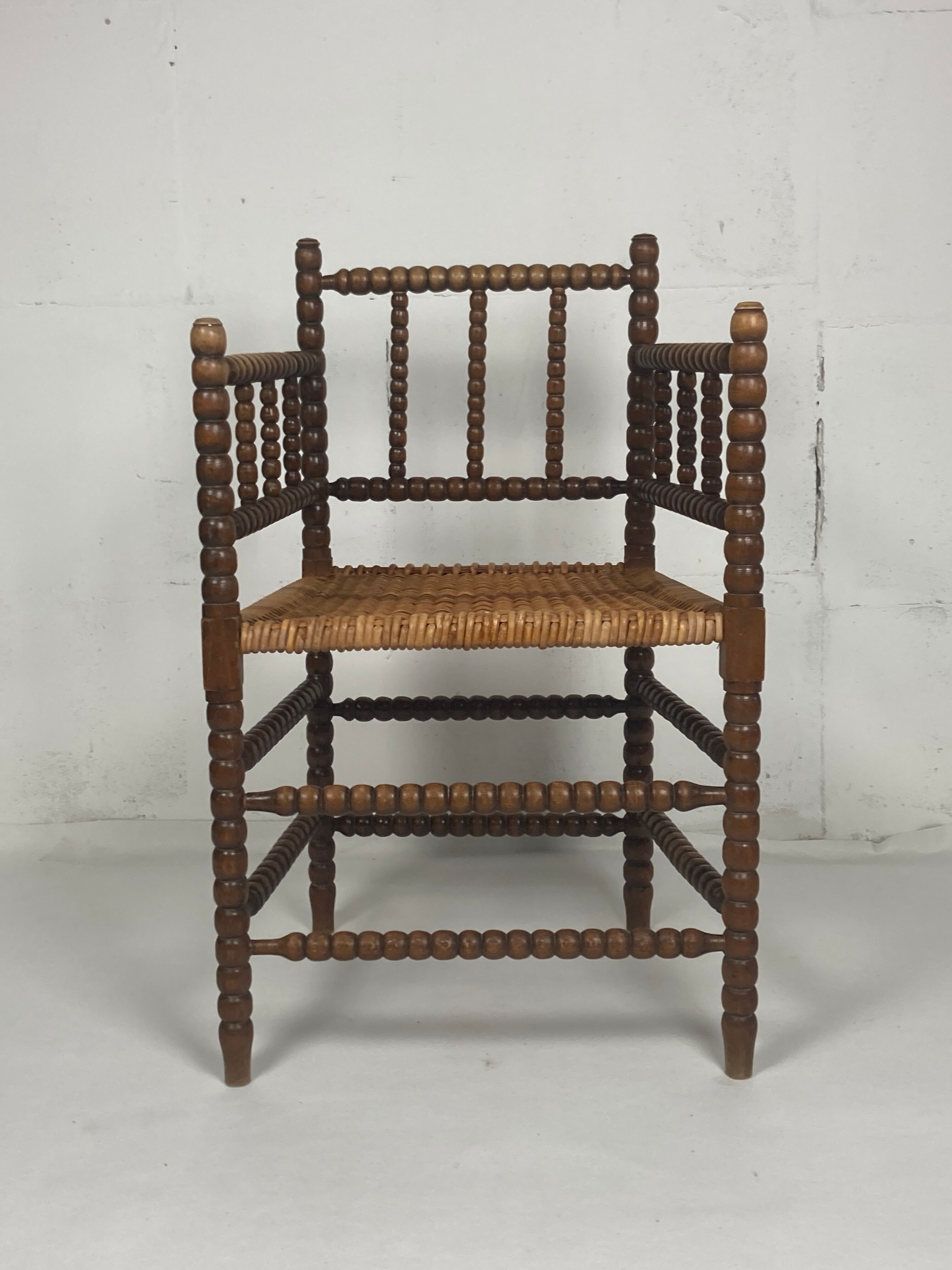 Fauteuil en osier et en bois tourné, années 1930 - 1950