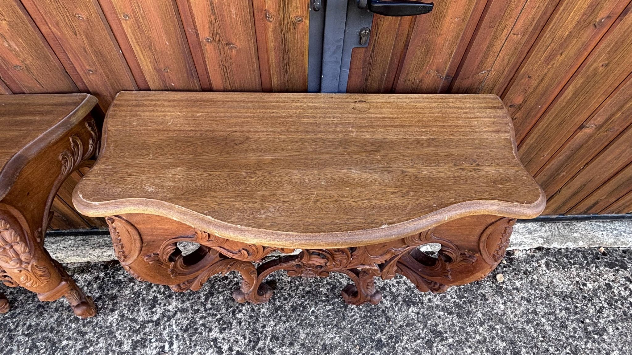 Pair of carved wall consoles in Louis XV style