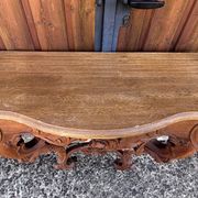 Pair of carved wall consoles in Louis XV style