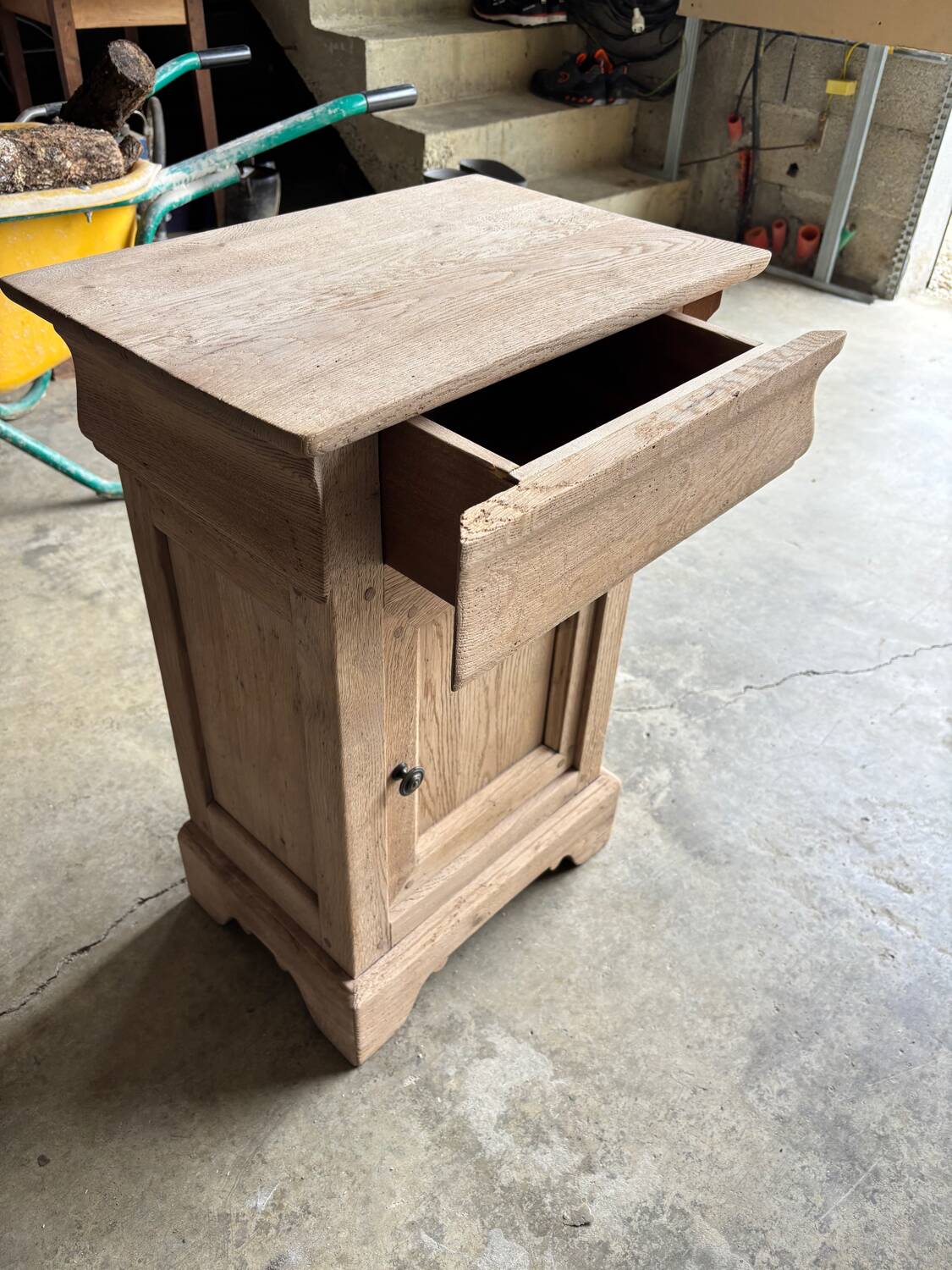 Raw wood bedside table