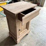 Raw wood bedside table