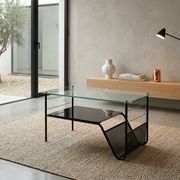 Metal and glass coffee table with magazine rack by Roche Bobois from the 1950s.