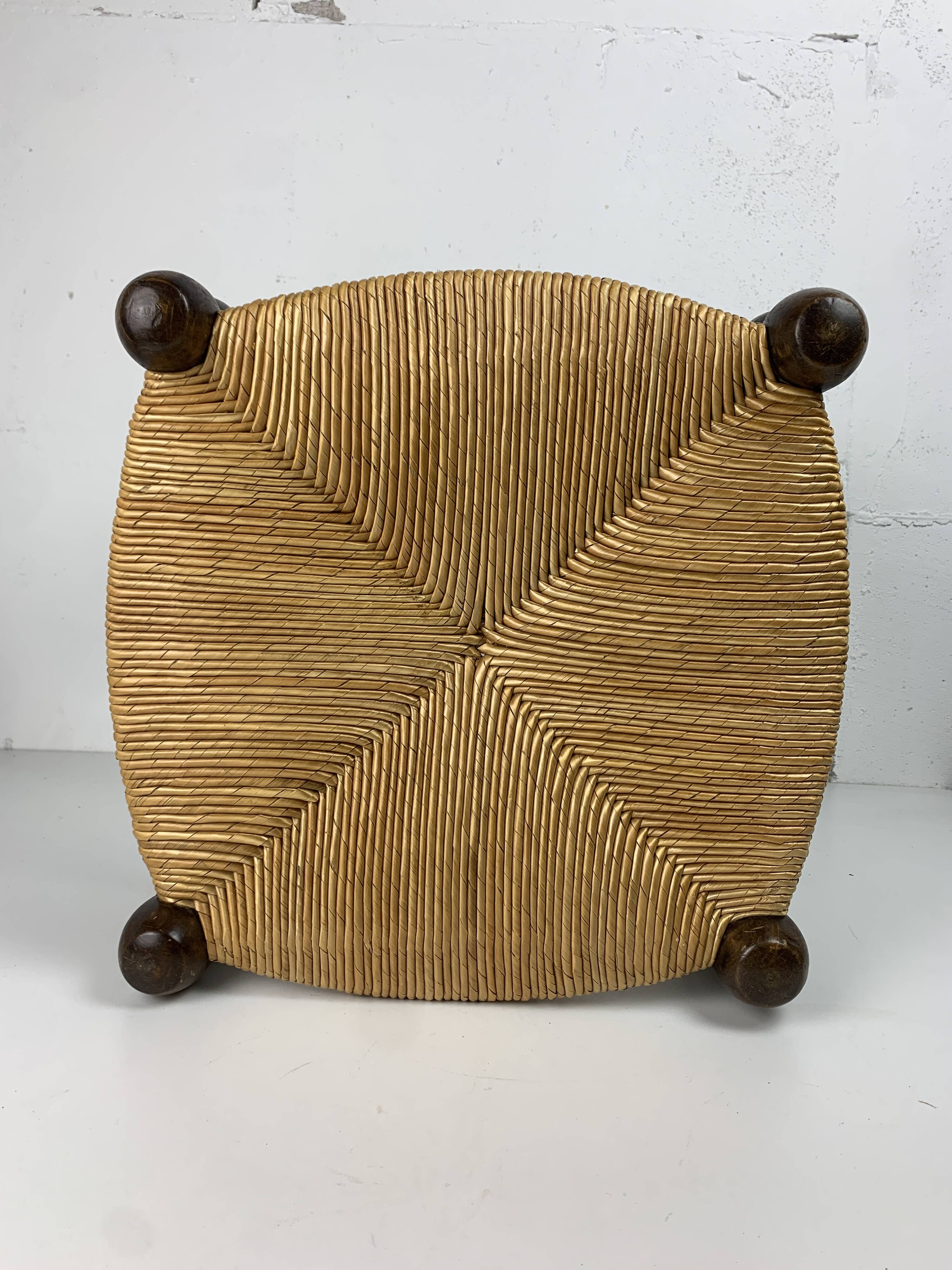 Brutalist wood turned bobbin rush stool in the style of Charles Dudouyt