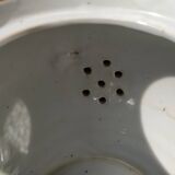 Asian set of a teapot and its cups
