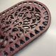 Old cast iron table mat