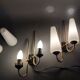 Pair of sconces in black metal and gilded brass 1960 Vintage.