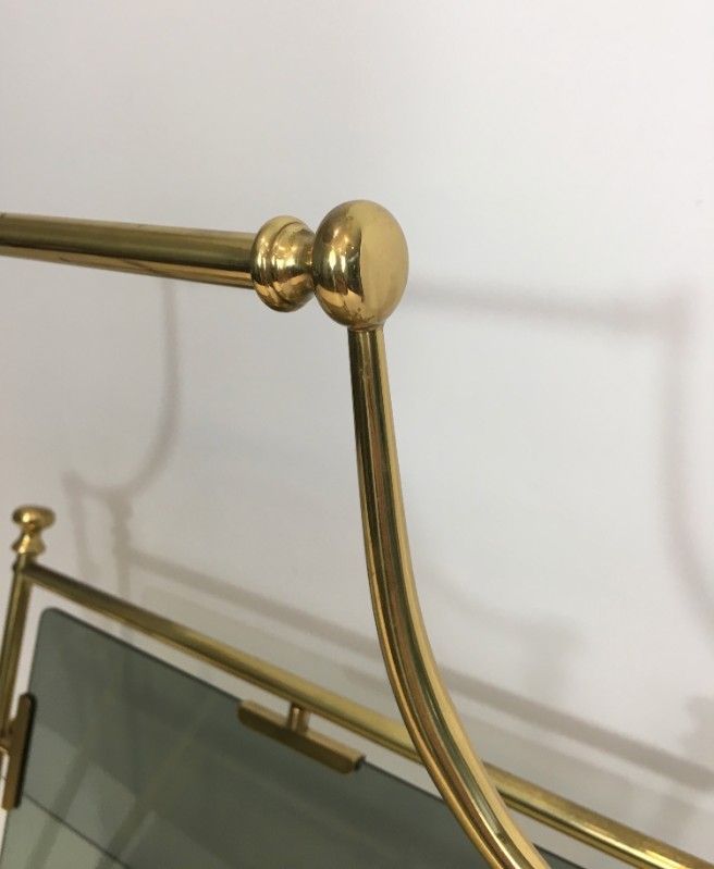 Neoclassical magazine rack in brass and blue glass