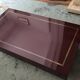 Burgundy lacquered coffee table with brass by Jean-Claude Mahey.