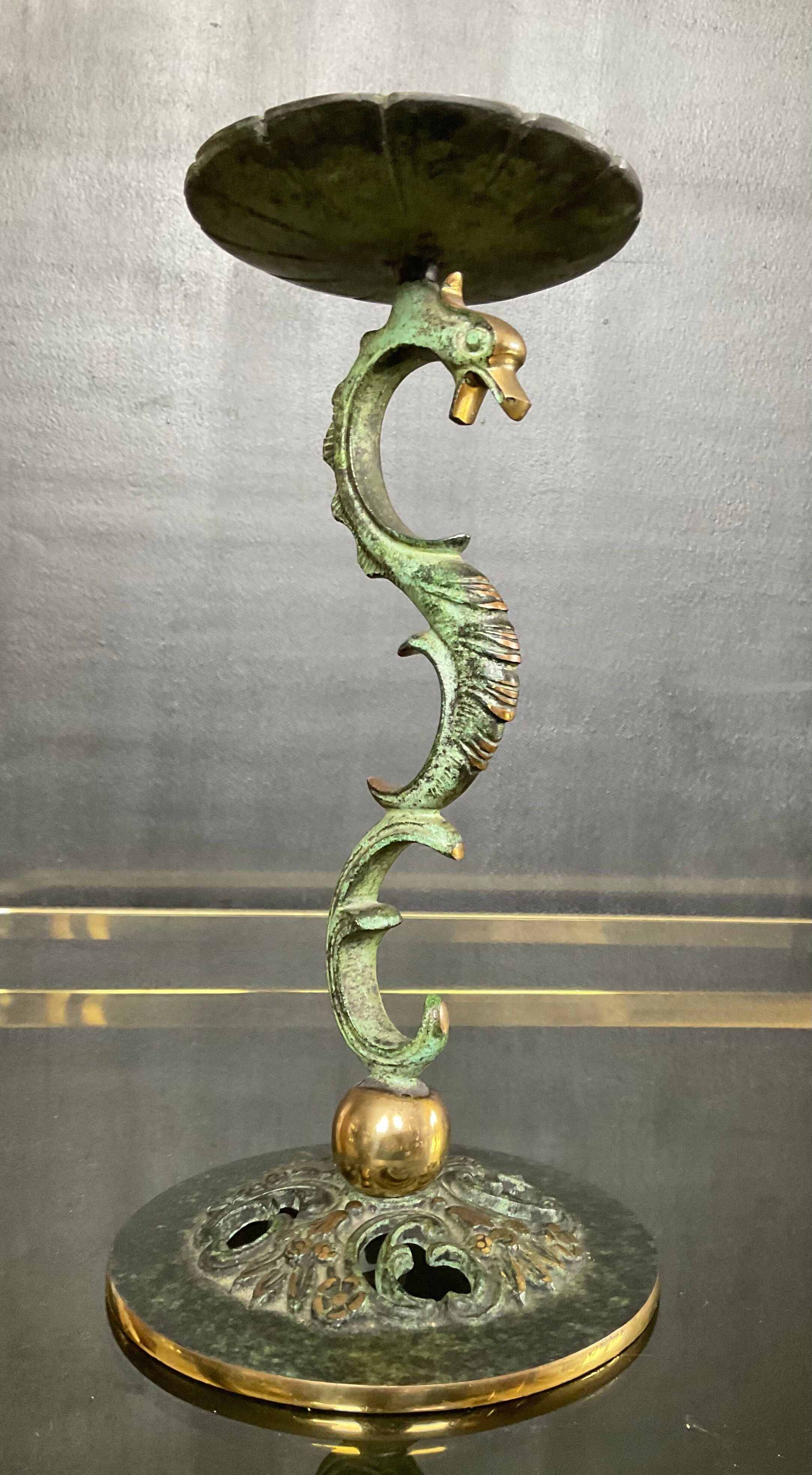 Empire style bronze candlestick with a candle holder