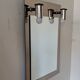 Vintage mirror with sconces.