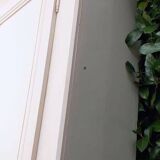 Pair of cupboard doors and old woodwork frame