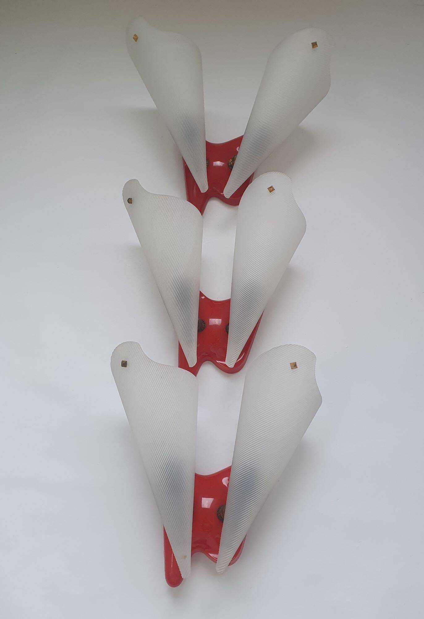 Three vintage rockabilly red plastic wall lights