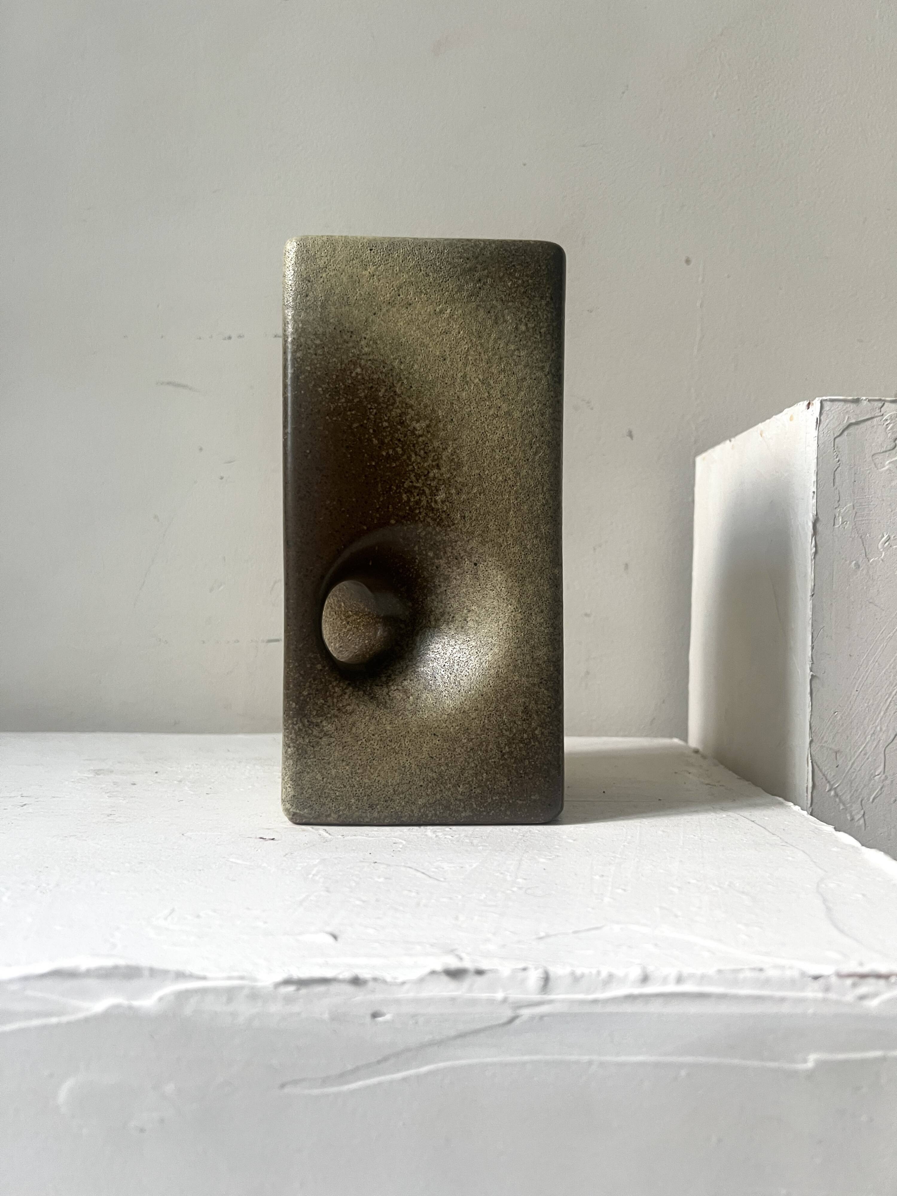 The modernist vase is German, VEB Haldensleben Fat Lava 1970.