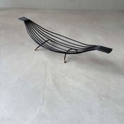 Minimalist black steel wire fruit bowl from the 1950s.