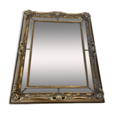 Golden mirror with a closed pore.