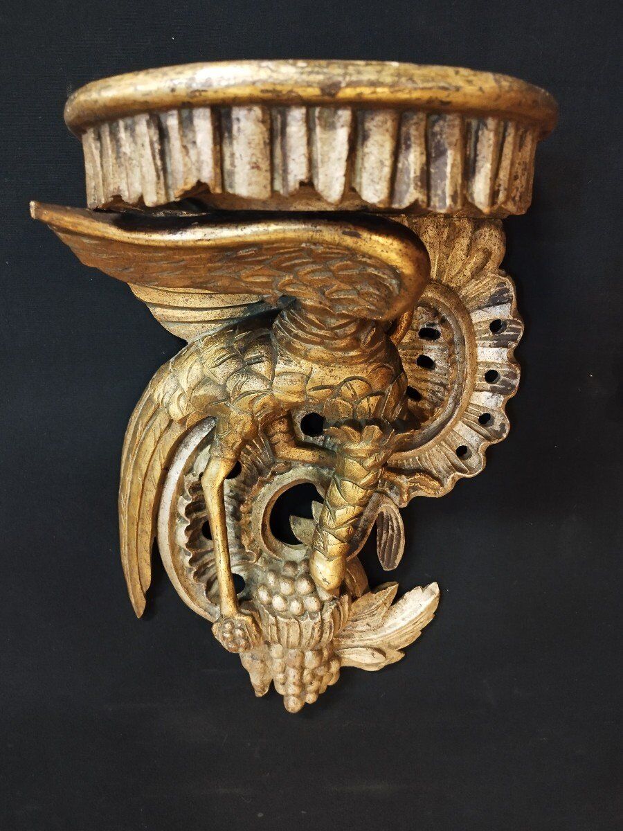 Pair of polychromed wooden wall mounts