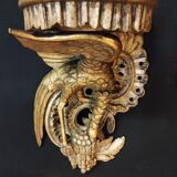 Pair of polychromed wooden wall mounts