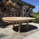 Round solid oak table with extensions, maximum 220cm.
