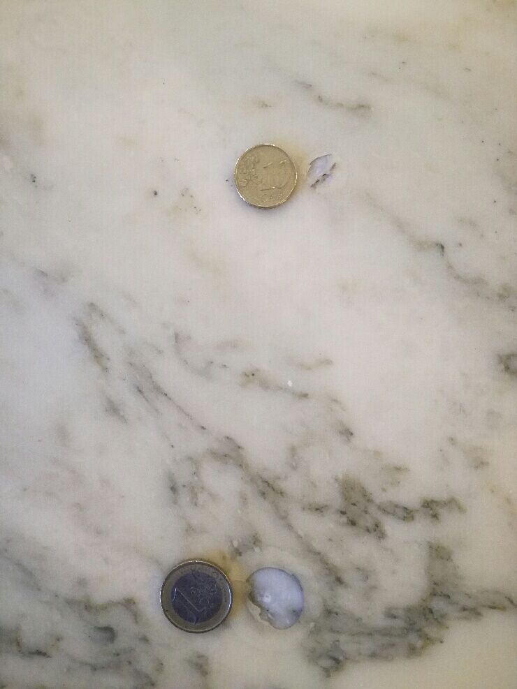 Marble table and stainless steel base