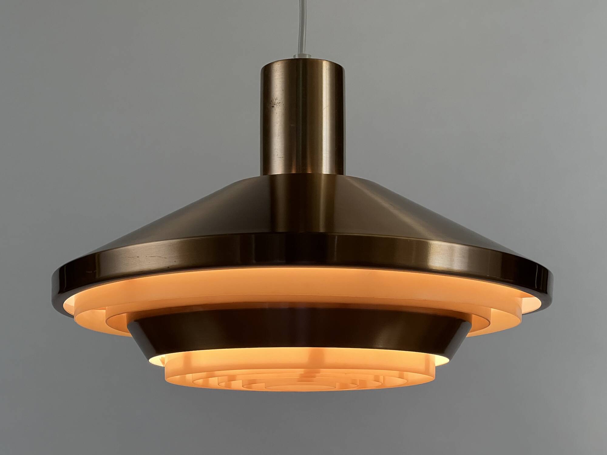 Copper colored aluminum pendant light from Lyskaer belysning. Denmark 1970s