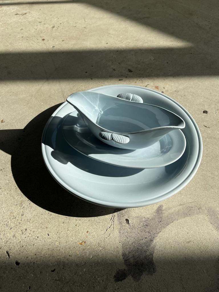 Flat set and light blue saucière earthenware from Montereau