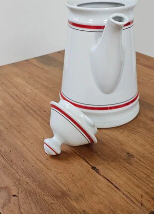 White porcelain coffee pot by Winterling with red lines.