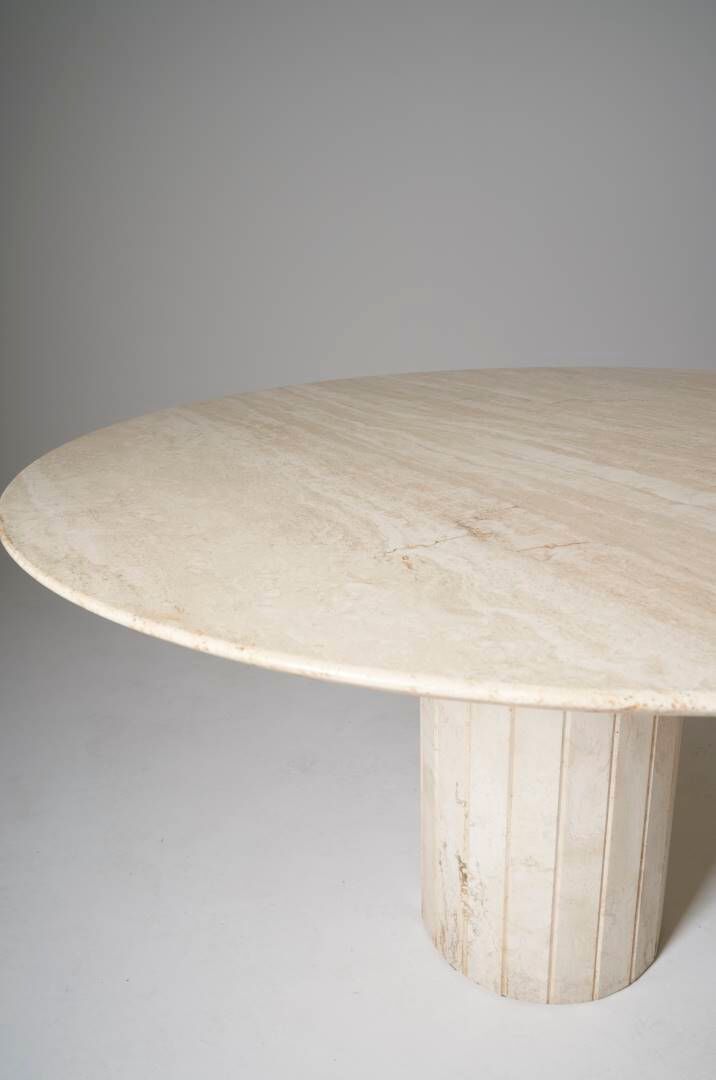 Round travertine dining table