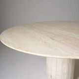 Round travertine dining table